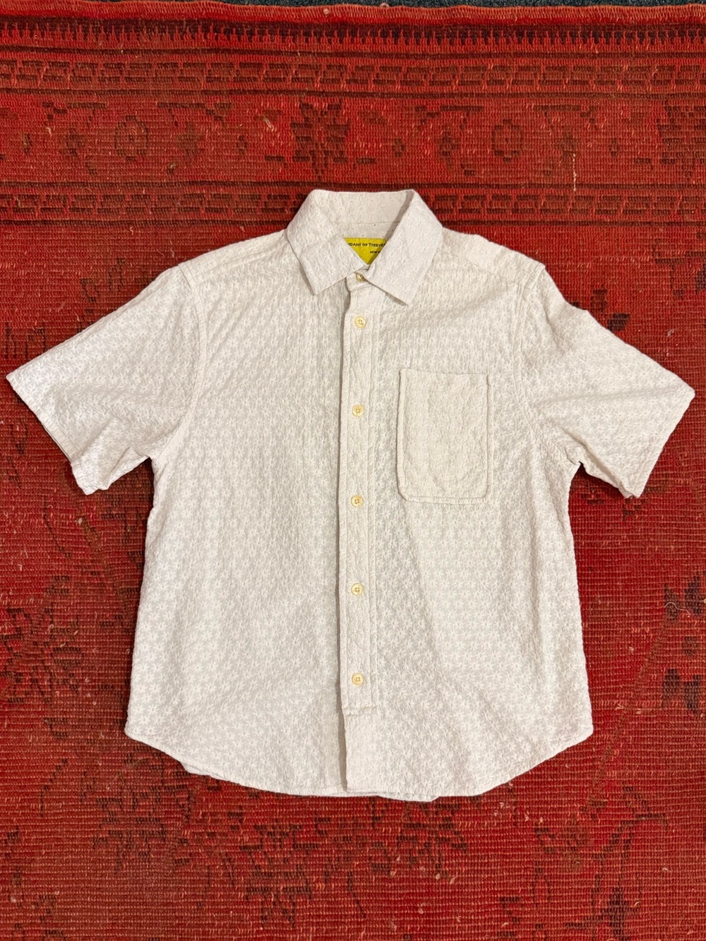 Descendant of Thieves “Italy Embroidery Star Cream” button up shirt.
